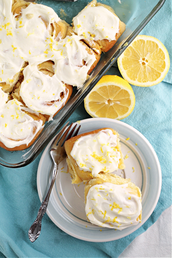 flatlay of sweet rolls These ooey and gooey Lemon Sweet Rolls Recipe has a bright lemony citrus flavor throughout and a delightful gooey lemon cream cheese icing!