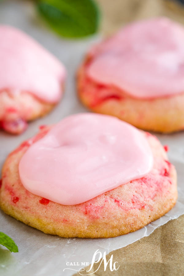 Frosted Amish Cherry Sugar Cookies are crispy around the edges yet pillowy soft and chewy inside. They get their pink color, great flavor, and soft texture from maraschino cherries. #cookies #cherrycookies #shirleytemple #shirleytemplecookies #homemade #recipes #dessert #Christmascookies Frosted Amish Cherry Sugar Cookies